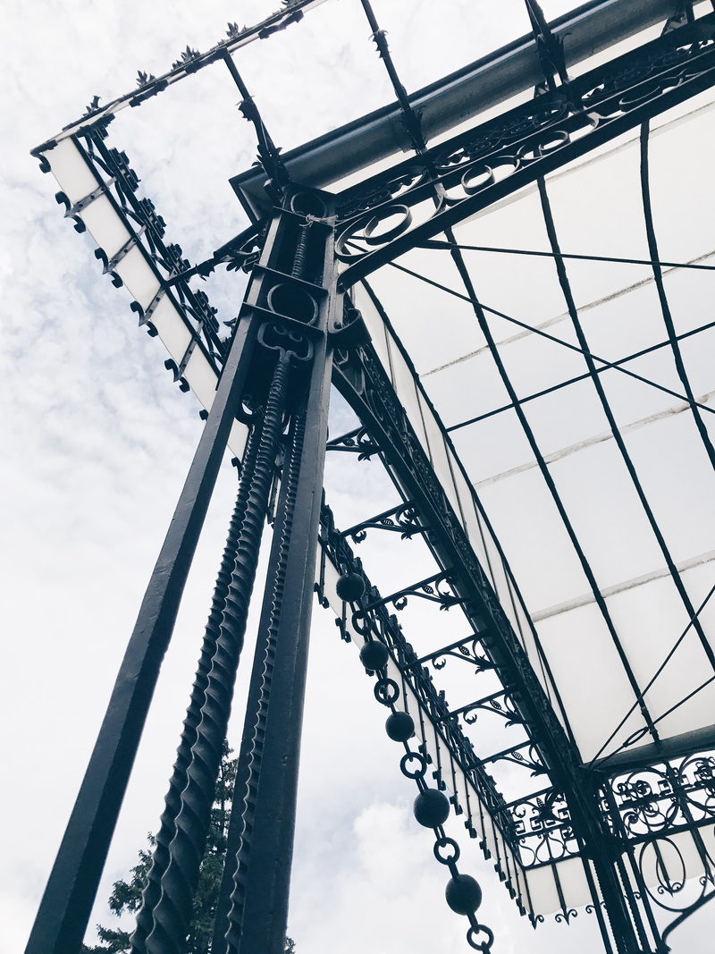 low angle view, angle, alloy, transportation, amusement park, cloud - sky, steel, rollercoaster, day, no people, sky, built structure, metal, blue, abstract