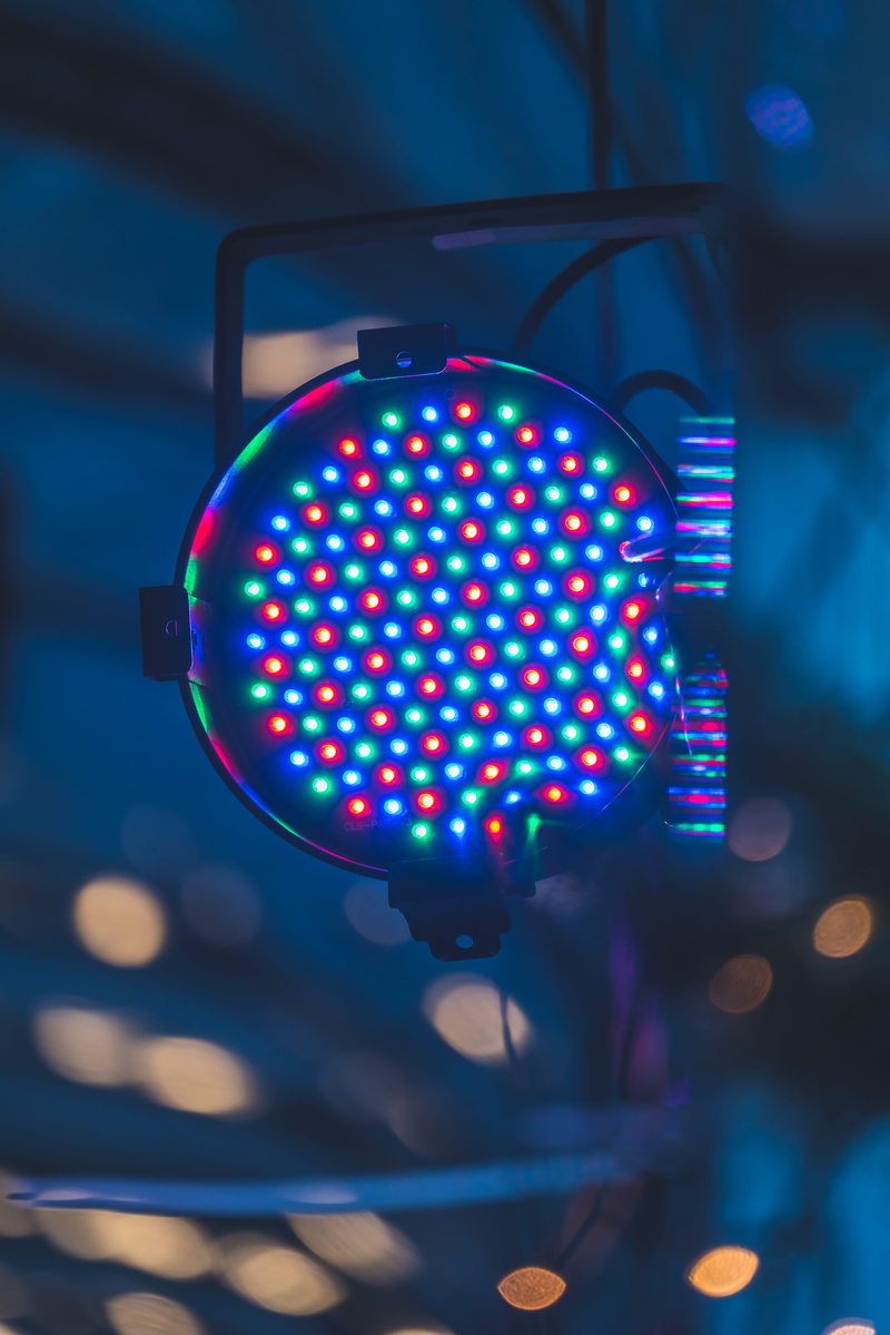 lighting equipment, lamp, fixture, red, lights, multicolored, focus on foreground, green, nightlife, technology, sign, multi colored, stoplight, communication