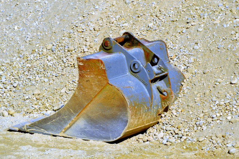 pollution, iron, one animal, high angle view, pebble, still life, outdoors, construction work, gravel pit, construction vehicle, day, backhoe bucket, excavators