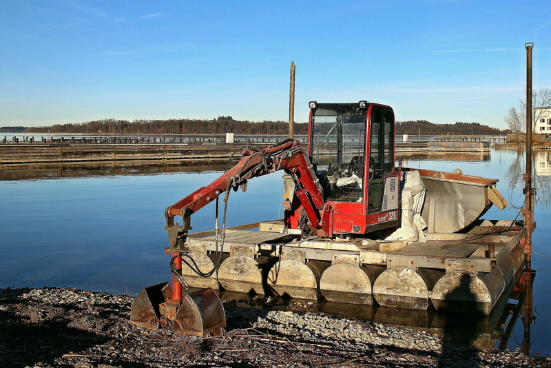 industry, outdoors, water construction vehicle, construction machine, transportation, occupation, backhoe bucket, day, port, nature, clear sky, no people