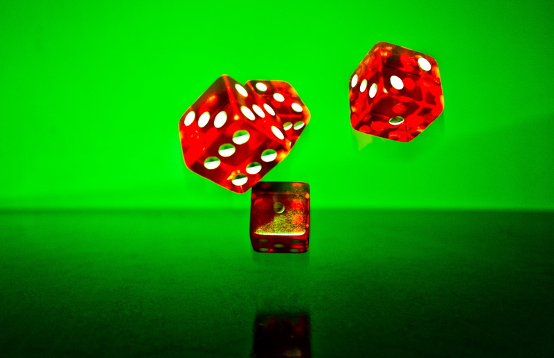 pair, dice, indoors, studio shot, poker game, gambling, green color, luck, game cube, leisure activity, arts culture and entertainment, red, lucky number