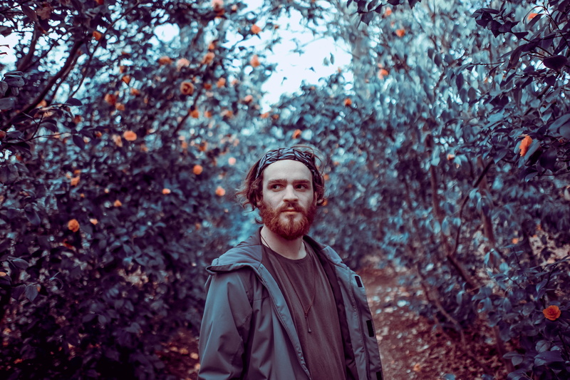 casual clothing, bushy park, lifestyles, real people, fantasy, greenery, forest, 4K, plant, standing, young men, outdoors, flowers, nomad, alice in wonderland