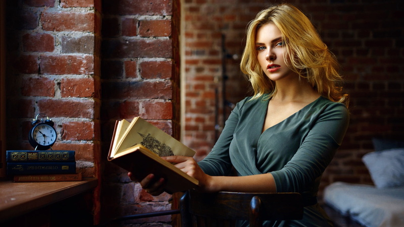 1080P, looking at viewer, sitting backwards, table, blonde, books, open mouth, dress, watch, yellow hair, model, Carla Sonre, women, chair, indoors, watches