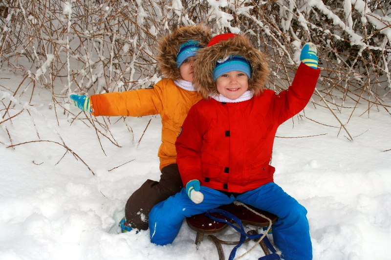 warm clothing, outdoors, child, innocence, snow, smiling, males, white, playing, joy, cold - Temperature, season, cheerful, people, sledge, leisure activity