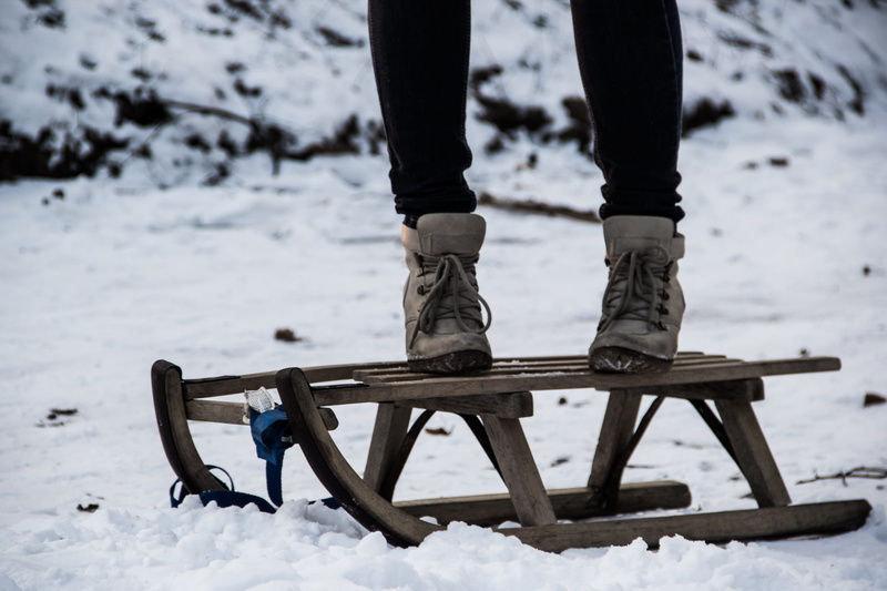 human body part, time, relaxation, youthful, outdoor, body part, young, sled, playful, common cold, soft, cool, snowcapped mountain, day, sledging, lifestyles