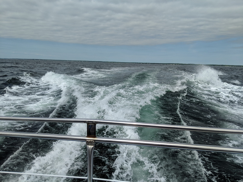 horizon over water, no people, wave, outdoors, fishing, deep sea fishing, cloud - sky, flowing water, power in nature, nature, railing, water, breaking