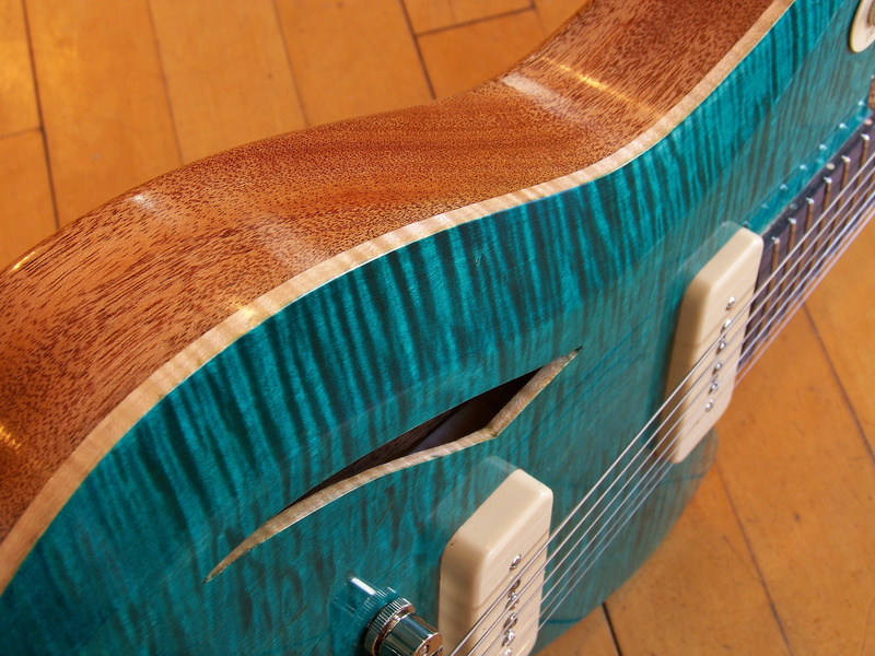 arts culture and entertainment, string instrument, music, musical equipment, absence, still life, blue, flooring, close-up, musical instrument, tc holtz