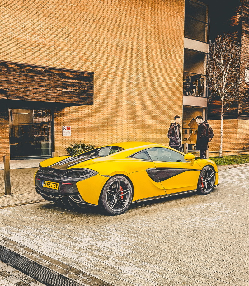 city, wall, car, transportation, outdoors, super car, mode of transportation, no people, motor vehicle, nature, building, built structure, street, land vehicle