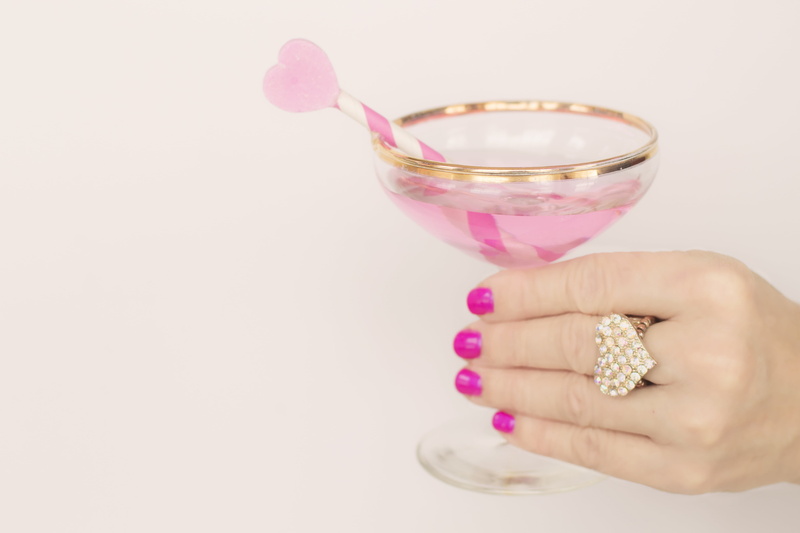 close-up, indoors, one person, copy space, white background, drink, valentines day background, nail, pink color, romance, footed, hand, heart, champagne