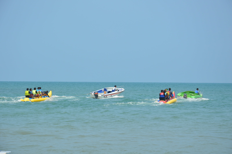 ride, boat, horizon over water, fun, group of people, women, joy, tropical, vacations, leisure activity, tourism, sky, lifestyles, day, play, banana boat