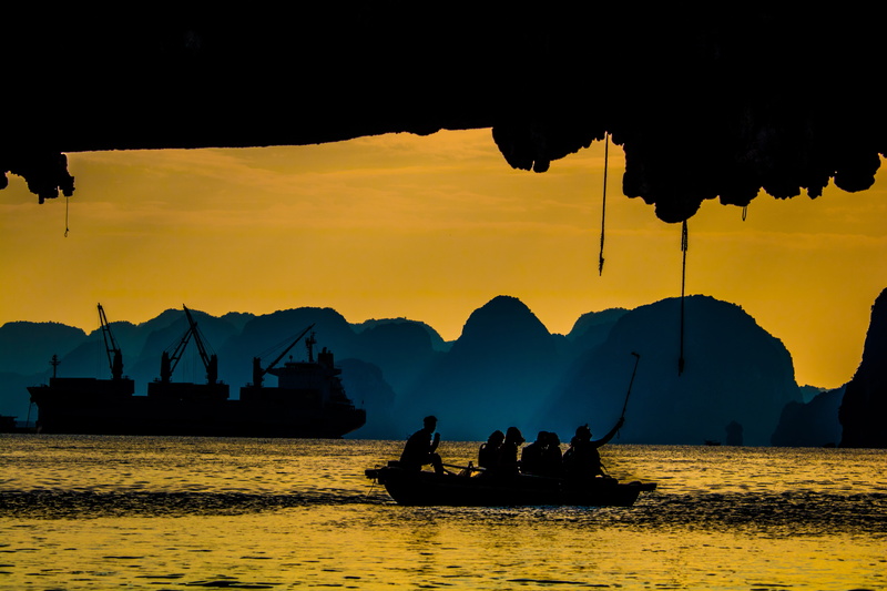 boat, men, transportation, nautical vessel, formation, sky, sunset, sea, waterfront, group, dark, orange color, rock, canoe, mode of transportation, real people