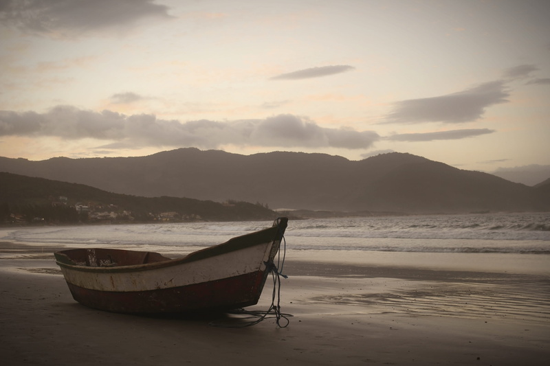 fishing boat, outdoors, non-urban scene, cloud - sky, brown, sunrise, sky, wave, daytime, no people, near, sunset, sea, seashore, mountain, nautical vessel