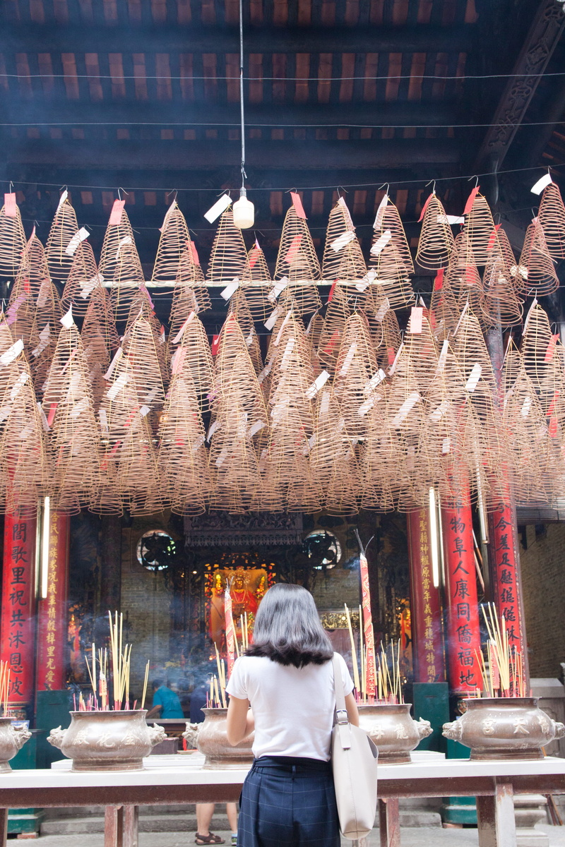lifestyles, temple, festival, place of worship, pray, incense, real people, shrine, praying, architecture, hanging, built structure, culture, tourist, religion