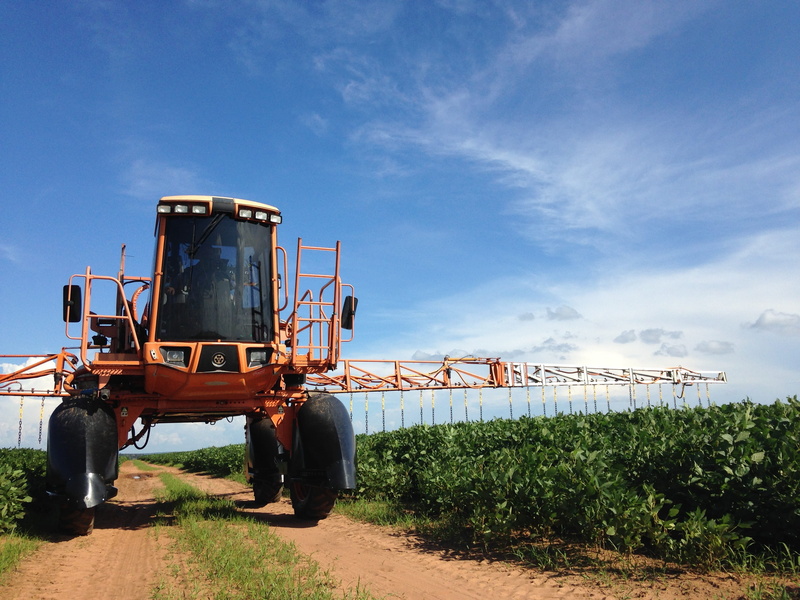 pests, outdoors, agricultural equipment, liquid, land, transportation, spray, day, tractor, industry, machinery, sky, poison, road, cloud - sky, mode of transportation