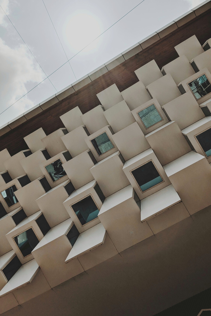 laptop, flooring, building exterior, no people, built structure, apartment, lcd screen, house, day, triangle, sky, electronics, architecture, wall, window