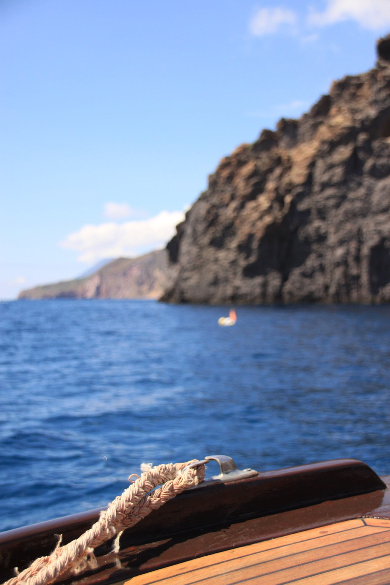 tranquil scene, italy, day, 9x16, sea, beauty in nature, island, scenics - nature, mountain, tranquility, vulcano, focus on foreground, blue, nautical vessel