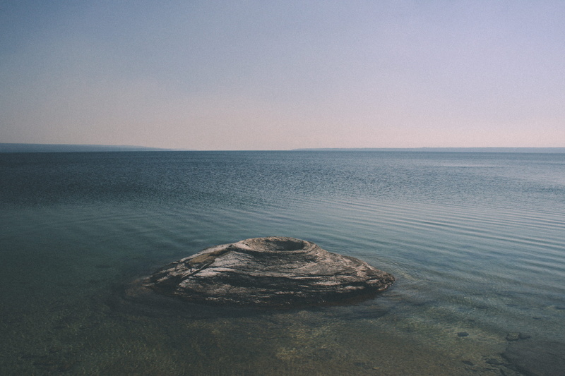 horizon over water, idyllic, yellowstone, horizon, beach, rock - object, nature, clear sky, 2K, solid, rock, beauty in nature, outdoors, scenics - nature