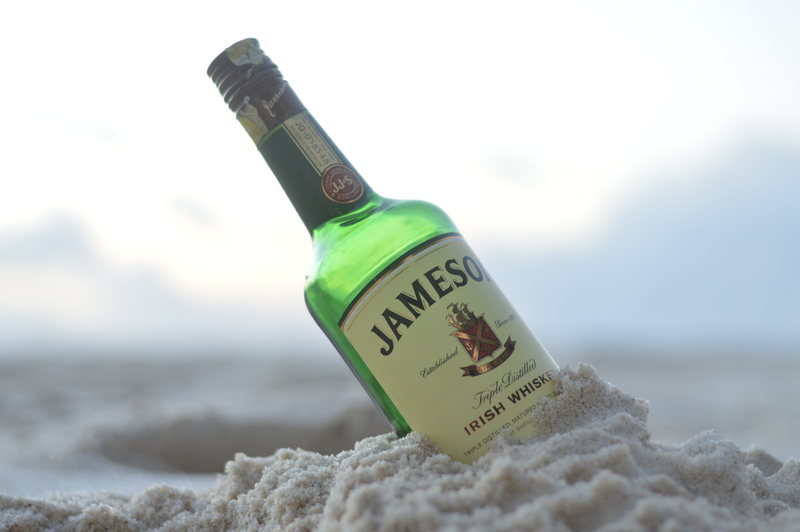 container, water, drink, bottle, food and drink, kenya, message, land, western script, refreshment, jameson, close-up, beach, alcohol, 5K, sand, focus on foreground