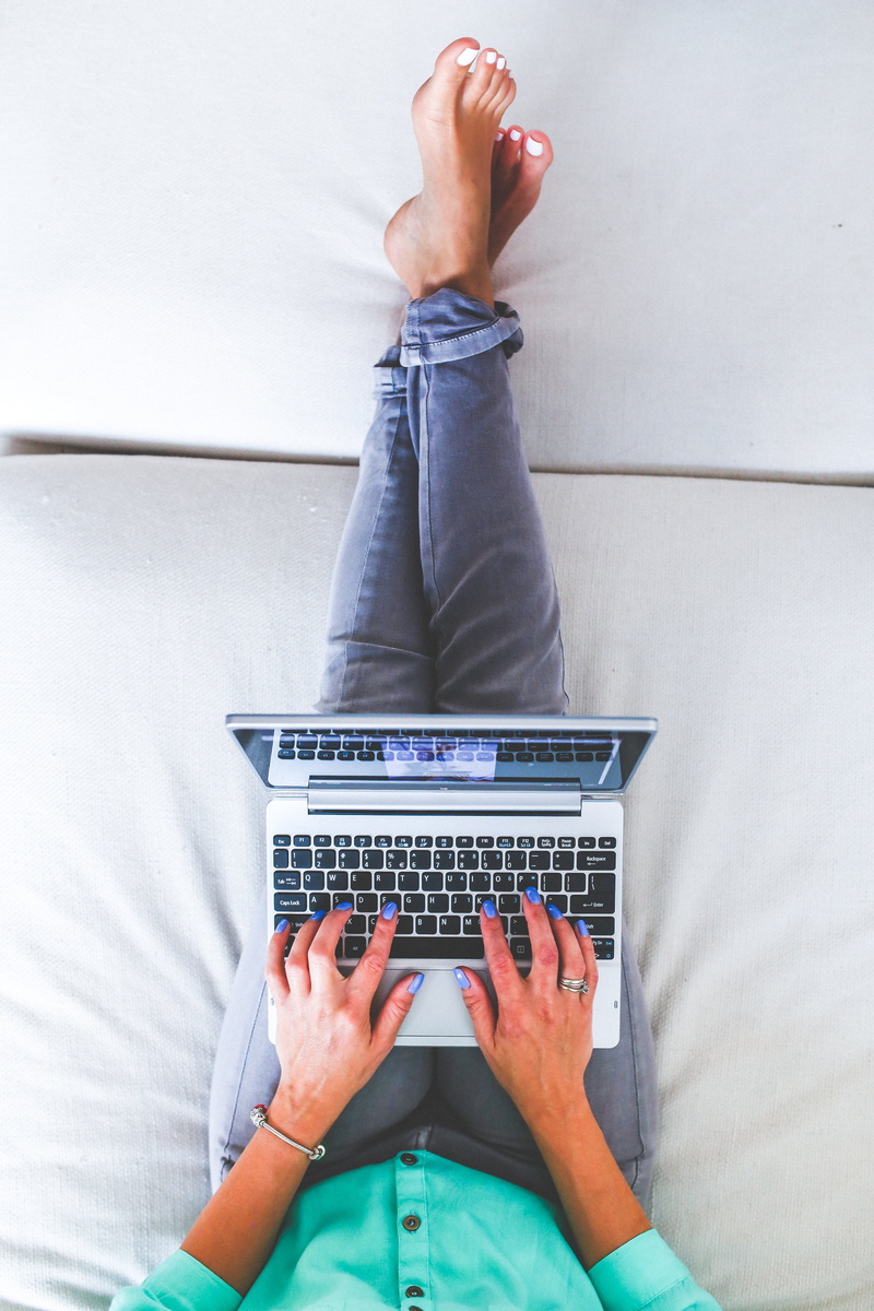 working, typing, lifestyles, casual clothing, jeans, human body part, sitting, job, officespace, indoors, adult, notebook, surfing the net, body part, computer