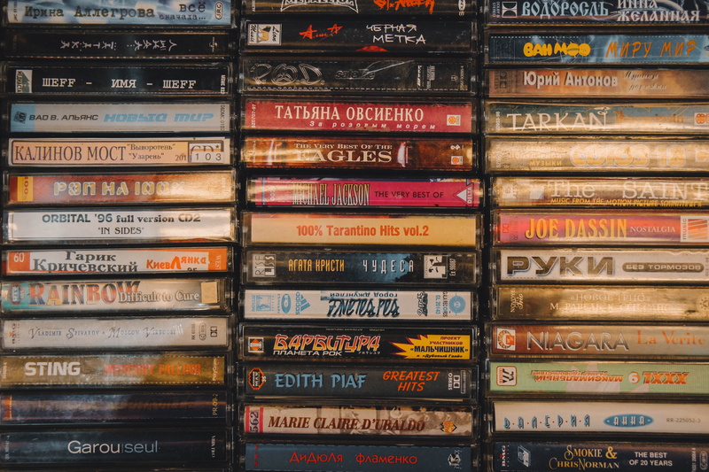 disk, no people, tape, crayon, gum, in a row, book, backgrounds, arrangement, shelf, choice, dvd, full frame, audio tapes, russian, order, electronics