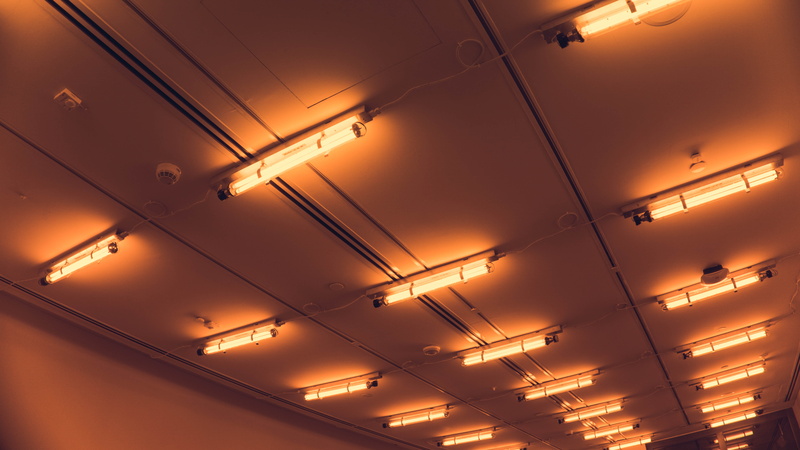 in a row, finance, ceiling, tones, lamp, electric transmission tower, bright, orange, bracket, luminosity, lightbulb, building, power lines, fluorescent