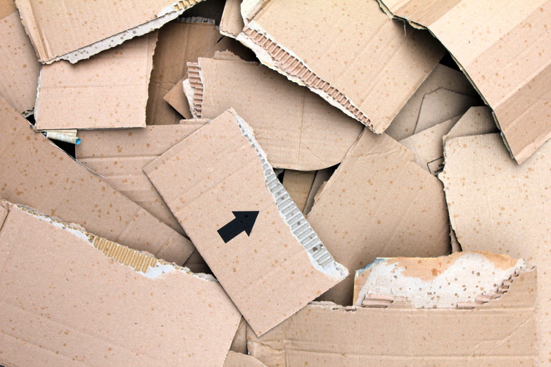 material, heap, no people, pieces, outdoors, cardboard, board, ridged, carton, corrugated cardboard, arrow, broken, brown, packaging, template