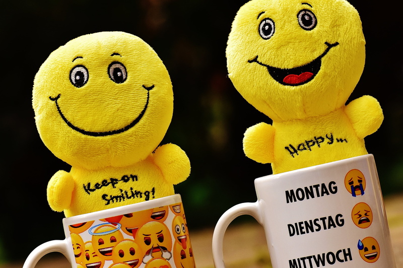 representation, feeling, emotion, happy, cup, toy, close-up, happiness, mugs, smilies, no people, emoticon, humor, all, coffee, black background, face