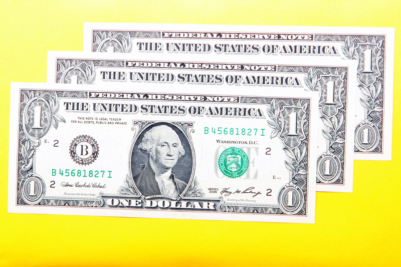 yellow, 2K, human representation, objects, bills, number, nobody, wealth, closeup, no people, close-up, single object, bringing home the bacon, financial