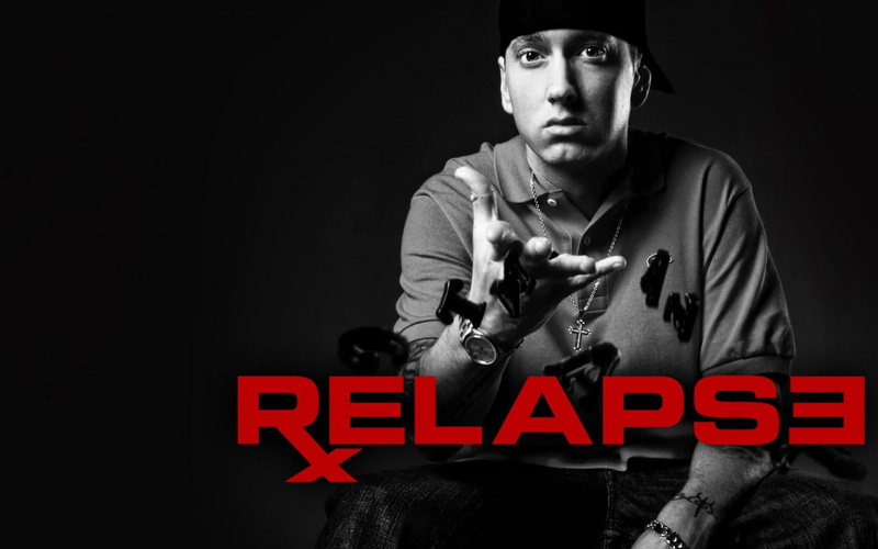 studio shot, shady, communication, contemplation, hip, text, sitting, hop, social issues, young men, capital letter, eminem, red, indoors, rap, slim, front view