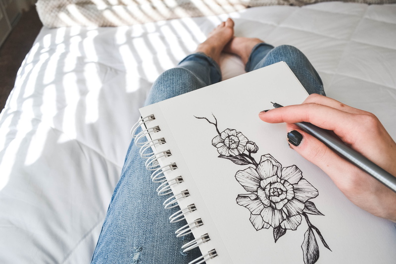 sketch, real people, high angle view, 4K, indoors, flower drawing, design, illustrate, drawing - activity, design professional, sketching, tailor, ink