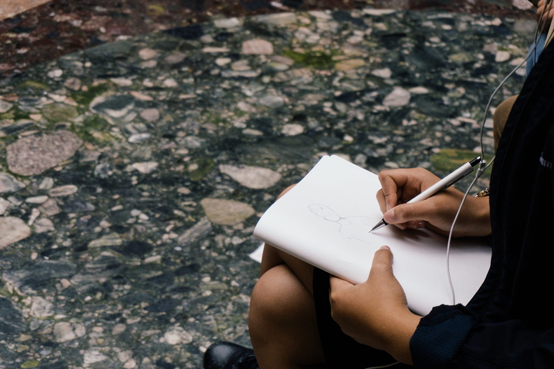 sketch pad, drawing - activity, women, person, 5K, lifestyles, adult, art and craft, hand, human hand, human body part, pencil, outdoors, holding, notebook