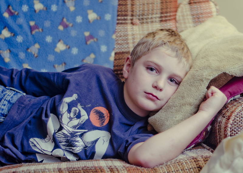 real people, boys, indoors, caucasian Ethnicity, looking at camera, couch, 2K, youth, furniture, males, one Person, men, sleepy, people, blanket, bed