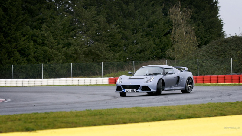 vehicle, mode of transportation, professional sport, sport, competitive sport, racecar, silver, day, motor racing track, wheel, 1080P, land vehicle, track and field