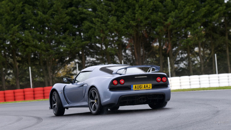 land vehicle, Lotus Exige, 1080P, vehicle, sport, car, motion, outdoors, sports race, mode of transportation, gray, motor vehicle, driving, plant, road
