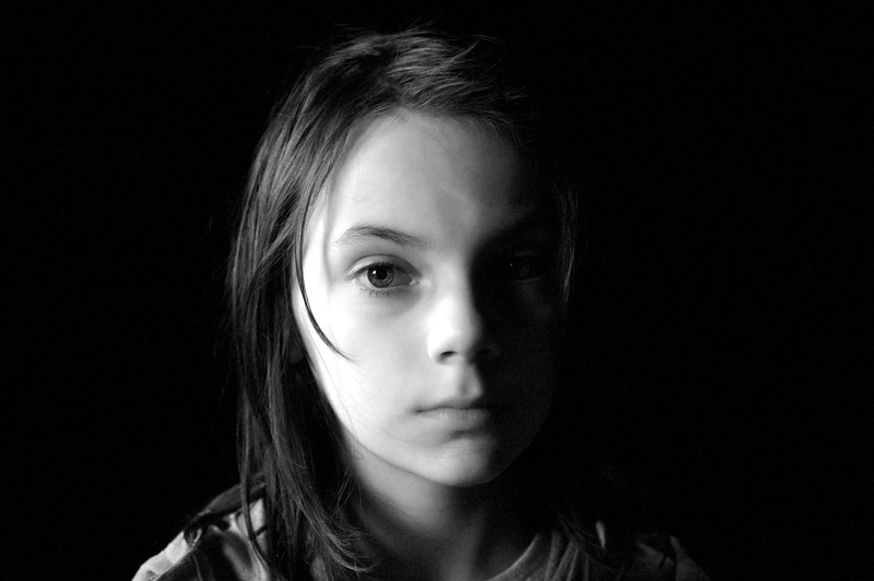 depression - sadness, beautiful woman, hairstyle, indoors, looking at camera, young adult, childhood, innocence, copy space, close-up, child, human body part