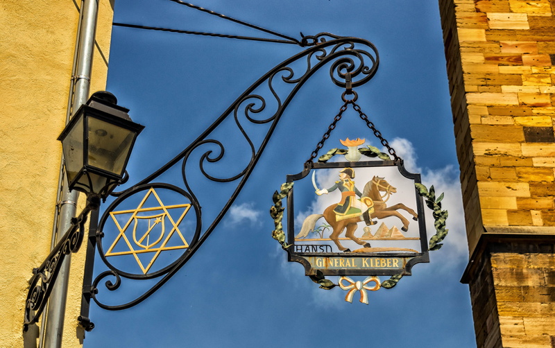 blacksmithing, art, window, place of worship, spirituality, built structure, lighting equipment, nature, low angle view, blue, sky, belief, building exterior