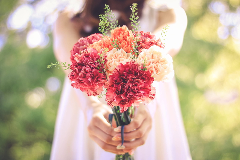 vulnerability, people, focus on foreground, focus, obscured face, human body part, outdoors, beauty in nature, celebration, flower head, selective focus