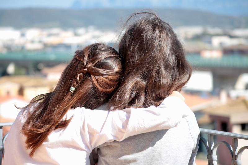 joy, outdoors, two people, females, affection, daughter, life, leisure activity, hugs, sea, loyalty, focus on foreground, hair, attachment, people, 5K