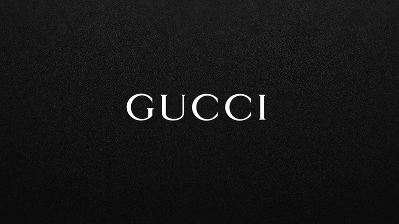 message, single word, fon, 4K, textured, indoors, black background, dark, western script, cut out, black, GUCCI, full frame, copy space, studio shot, capital letter