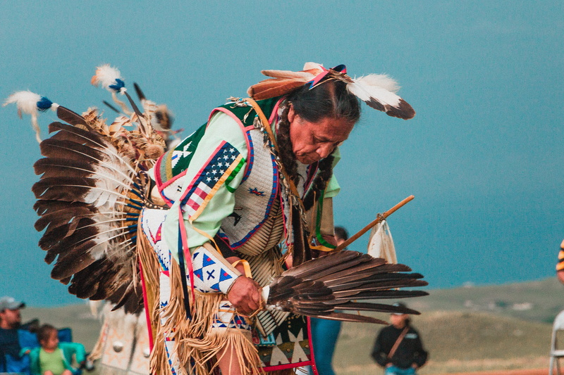 men, festival, performance, traditional festival, dancing, indian, crowd, man, native american, focus on foreground, day, people, pow wow, holding, arts culture and entertainment