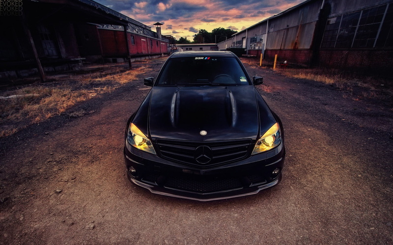 black, built structure, land vehicle, truck, cloud - sky, mercedes, motor vehicle, city, day, car, sky, mode of transportation, building, no people, stationary