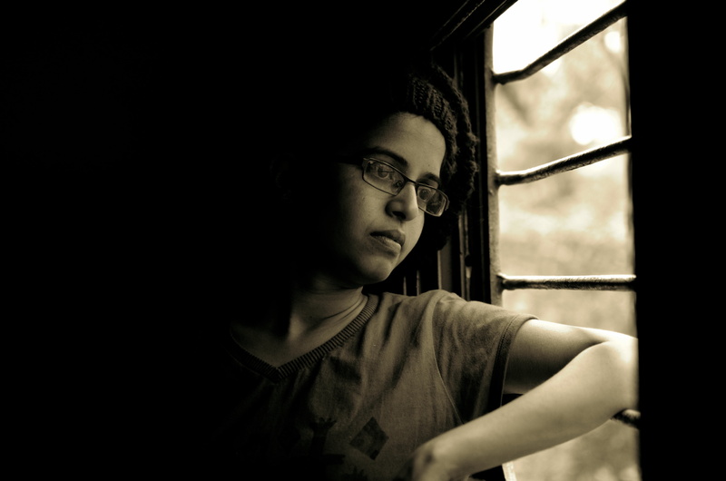 kid, person, alone, bars, male, woman, glasses, front view, teenager, looking away, lean, eyeglasses, portrait, women, sad, grate, indoors, leisure activity