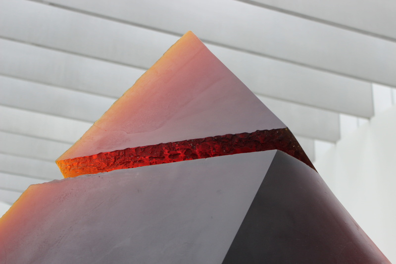 shape, triangular, wall - building feature, cone, concrete, no people, perspective, paper, sunlight, ornament, focus on foreground, built structure, day