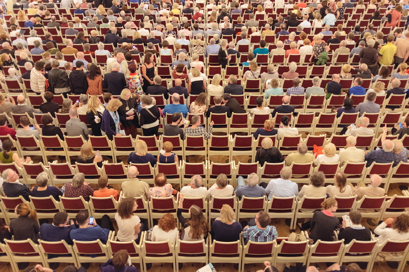 backgrounds, entertainment, day, spectators, adult, chair, music, spectator, men, high angle view, listeners, side by side, full frame, people, lifestyles