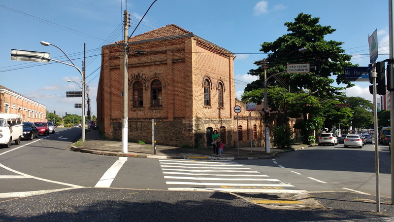 building, sidewalk, city street, car, city, 4K, motor vehicle, marking, road, sunlight, tree, sky, zebra crossing, outdoors, the twentieth century, incidental people
