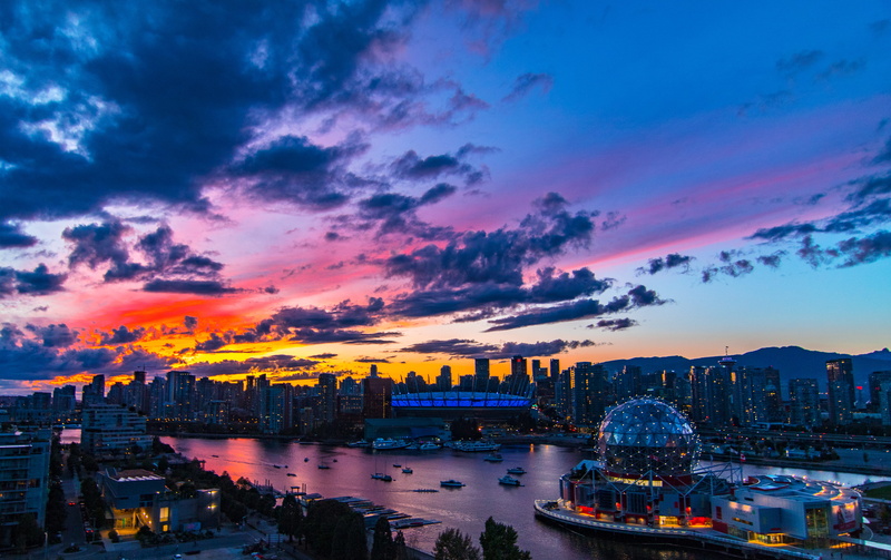 cloud - sky, office building exterior, cityscape, skyscraper, built structure, travel, ocean, sky, evening, town, near, dusk, sunset, building, travel destinations