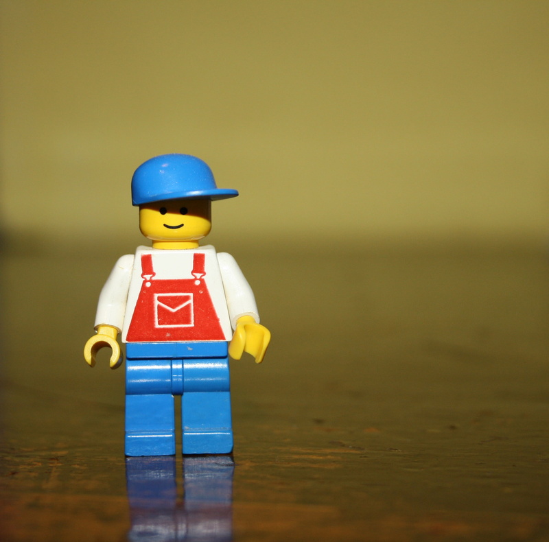 male likeness, focus on foreground, children, creativity, person, buildings, people, headwear, cycling cap, lego man, wood - material, play, offspring
