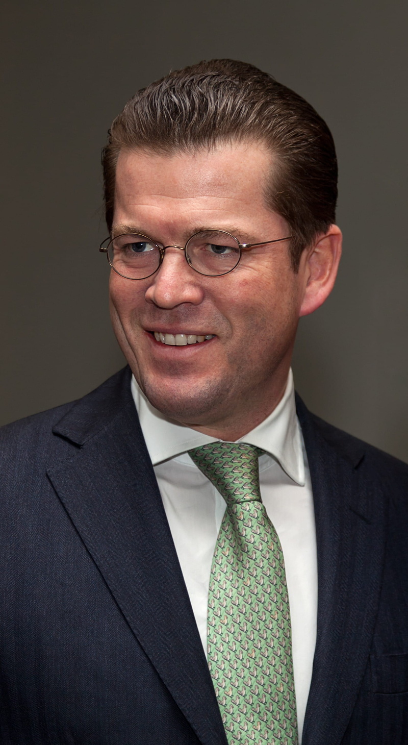 black Background, glasses, confidence, human Face, one Person, Politician, smiling, necktie, member of parliament, men, germany, head And Shoulders, studio Shot