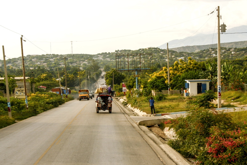road, tap tap, electricity, driving, city, street, electricity pylon, the way forward, building exterior, mode of transportation, transportation, direction