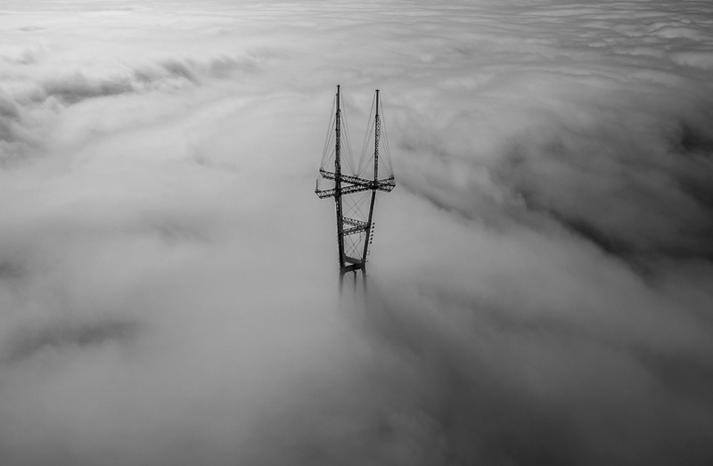 silhouette, tranquil scene, electric, mast, beauty in nature, twin peak, cable, tranquility, tower, post, cloud - sky, black and white, structure, water